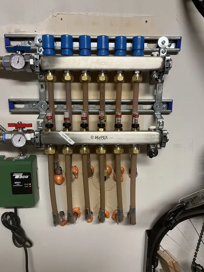 Plumber performing Gas Line Installation at a residential property in Chesapeake